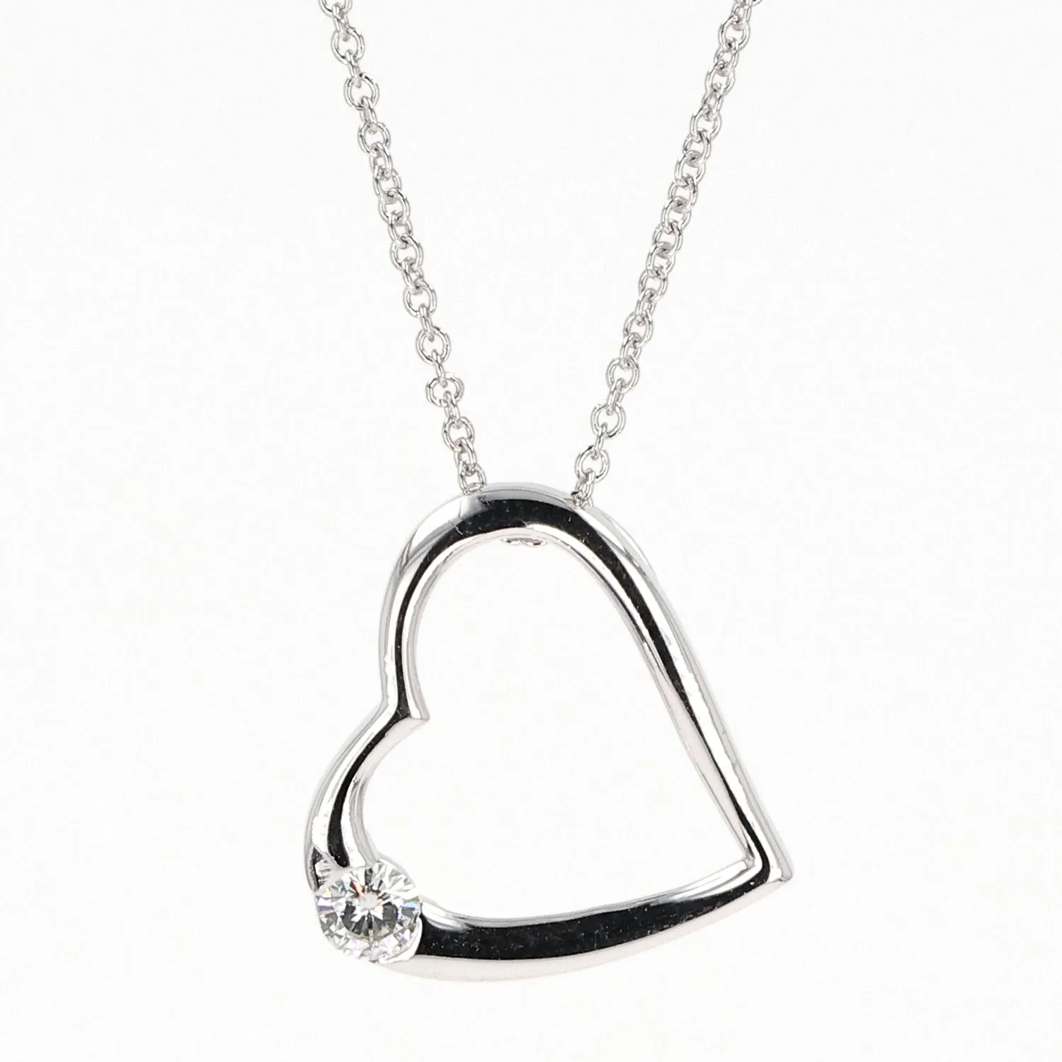 0.13 CTW DEW Moissanite Heart Pendant in Sterling Silver