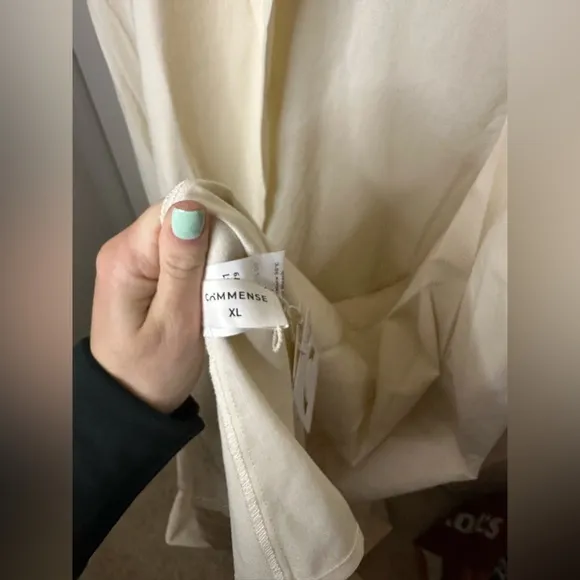 Elegant Cream Sleeveless Drape Cardigan