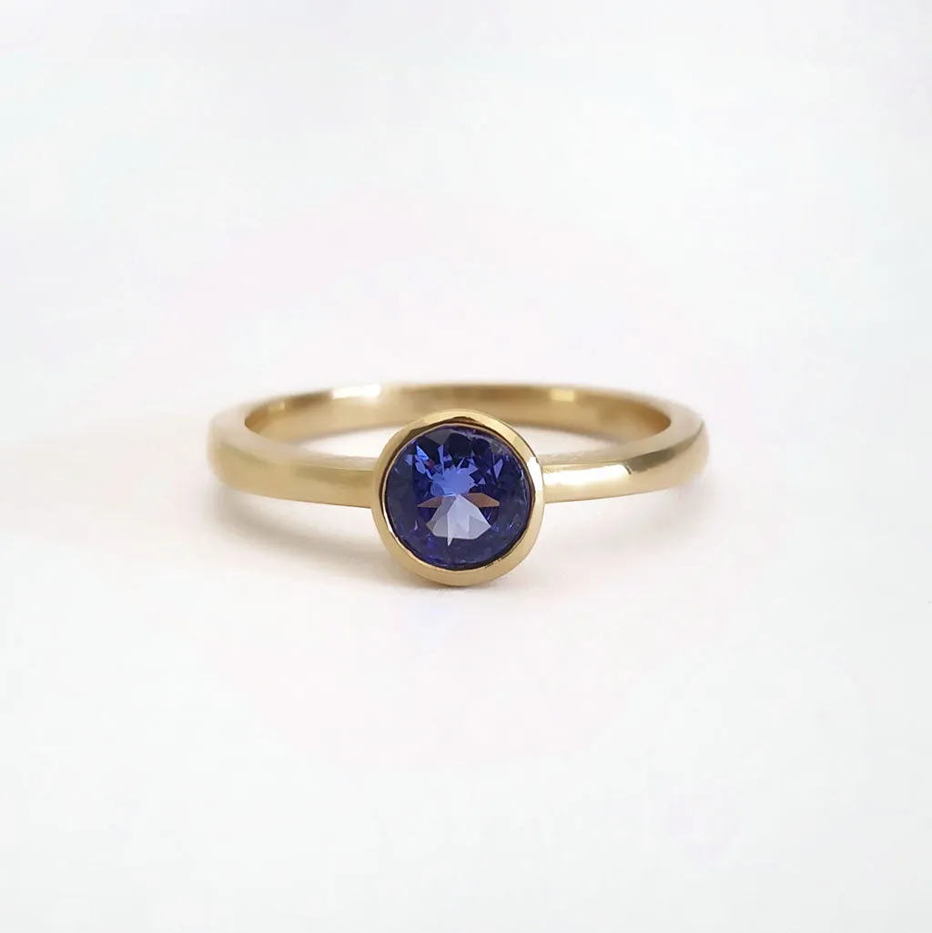 Elegant Round Cut Bezel Set Solitaire Tanzanite Ring